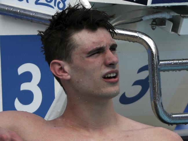 England's Ben Proud reacts after he was disqualified in his men's 50m butterfly heat during the 2018 Commonwealth Games at the Aquatic Centre on the Gold Coast, Australia, Thursday, April 5, 2018. (AP Photo/Rick Rycroft)