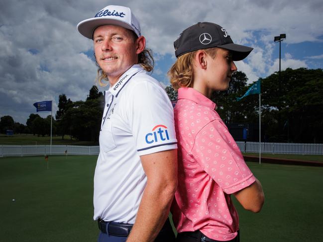 Cameron Smith with Cooper Field 14, (son of coach Grant Field), at the Royal Queensland Golf Club. Picture Lachie Millard