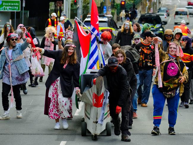 Protesters take part in the Zombie Rave as part of disruptions to the expo. Picture: NewsWire