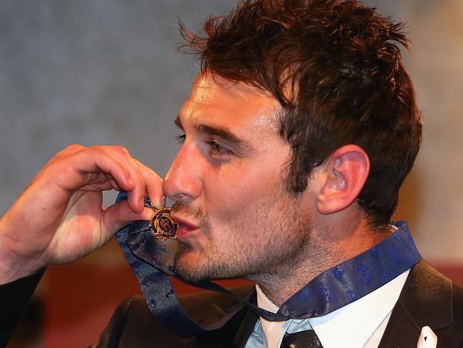 MELBOURNE, AUSTRALIA - SEPTEMBER 24:  Jobe Watson of the Bombers poses with the Brownlow Medal during the 2012 Brownlow Medal at Crown Palladium on September 24, 2012 in Melbourne, Australia.  (Photo by Quinn Rooney/Getty Images)