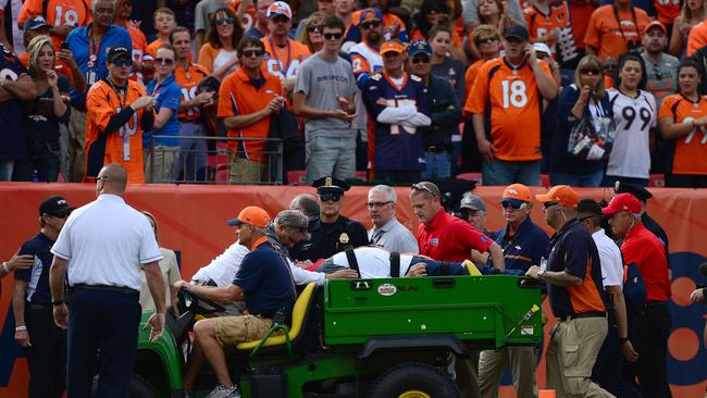 Defensive co-ordinator Wade Phillips is carted off the field.