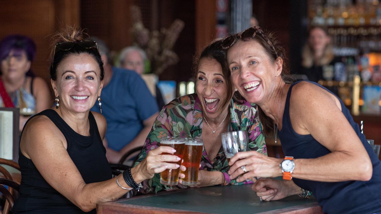 Fionnuala McCarthy (from left), Rosie Cookson, and Amelia Jones enjoy a couple of beers that will soon cost them much more. Picture: Julian Andrews