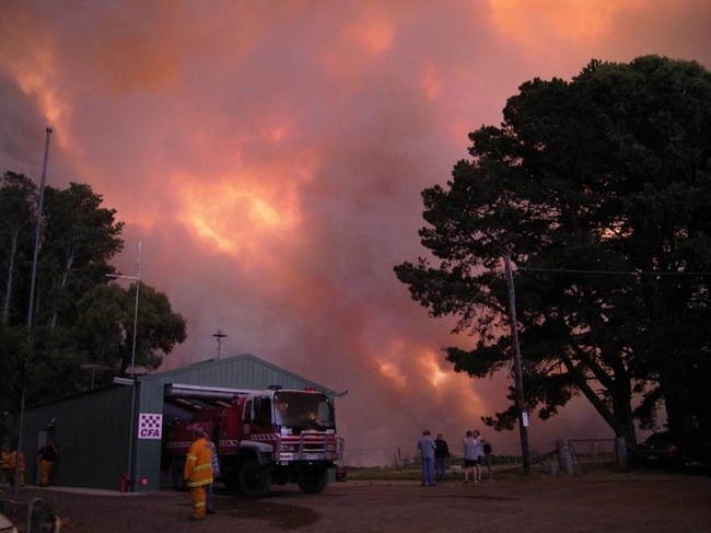 Locals watch the Kilmore East Fire from the Kinglake West Fire Station on Black Saturday, February 7, 2009. Picture: Supplied