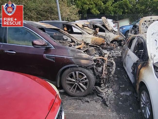 The damaged cars in a Sydney Airport carpark. Picture: Fire and Rescue NSW