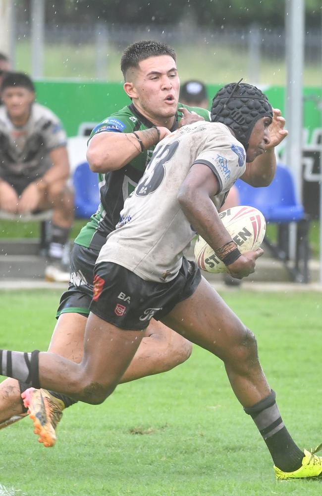Meninga Cup Blackhawks against Souths Logan Magpies at Jack Manski Oval. Magpies Jayden Solien is tackled by Sitiveni Afu. Picture: Evan Morgan