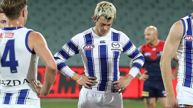 AFL - Sunday, 9th August, 2020 - Melbourne v North Melbourne at the Adelaide Oval. Kangaroos players after the loss - Jasper Pittard (centre) Picture: Sarah Reed