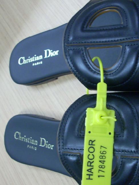 Christian Dior shoes found in Caddick’s home.