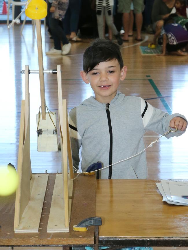 Noah Nepia, 6, from Pimpama tries a catapult from Coombabah High. Picture: Glenn Hampson