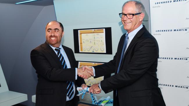 Flinders University defence partnerships director Tony Kyriacou with Lockheed Martin Australia Submarine Program director Mike Oliver at the Future Submarine Program Combat System laboratory in Mawson Lakes. Picture: David Mariuz/AAP Image 