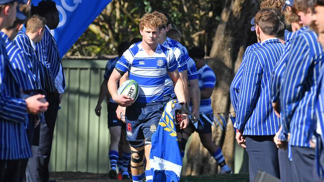 Nudgee run onto the ground for the start of the game. Nudgee College v BSHS in the GPS First XV rugby. Saturday August 20, 2022. Picture, John Gass