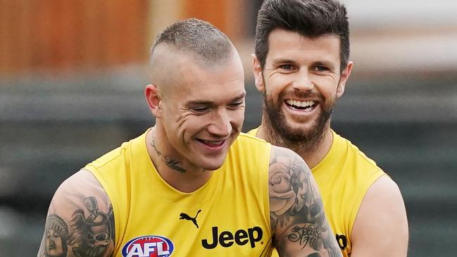 Dustin Martin and Trent Cotchin share a laugh at training.