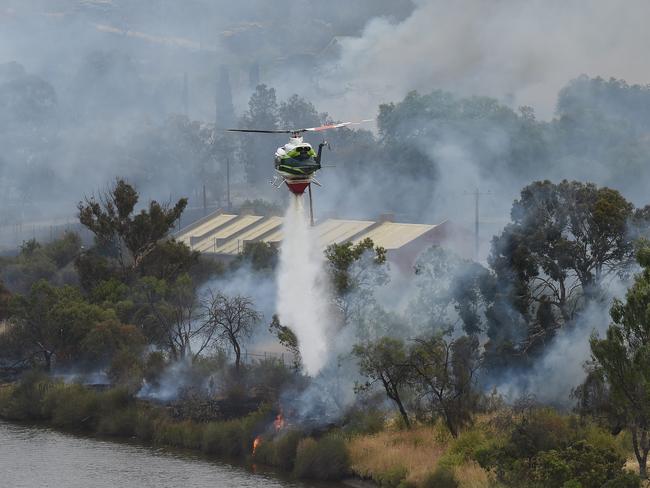 Dozens of firefighters battled the large grassfire in Maribyrnong on January 1, 2022. Picture: Josie Hayden