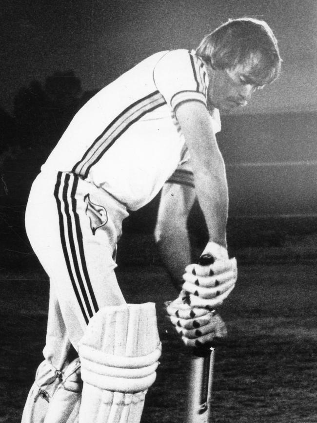 SA cricket captain David Hookes under the glare of one of the Thebarton Oval spotlights, in 1981.