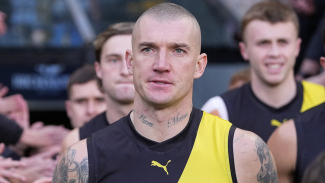 MELBOURNE, AUSTRALIA - JUNE 30: Dustin Martin of the Tigers runs out with the team during the round 16 AFL match between Richmond Tigers and Carlton Blues at Melbourne Cricket Ground, on June 30, 2024, in Melbourne, Australia. (Photo by Daniel Pockett/Getty Images)