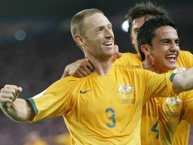 Socceroos Craig Moore, (L) jubilates with teammate Tim Cahill, (R) after scoring his sides first goal during the Croatia vs Aust Group /F soccer match at the World Cup Gottlieb-Daimler stadium in Stuttgart, Jun 22, 2006. (AP PicThomas/Kienzle) sport o/seas action