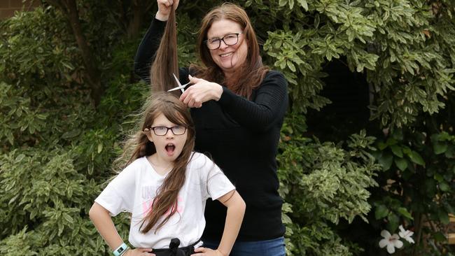 Nicole Lethlean and her daughter Ava, 9, who is donating her hair for the World’s Greatest Shave. Picture: George Salpigtidis