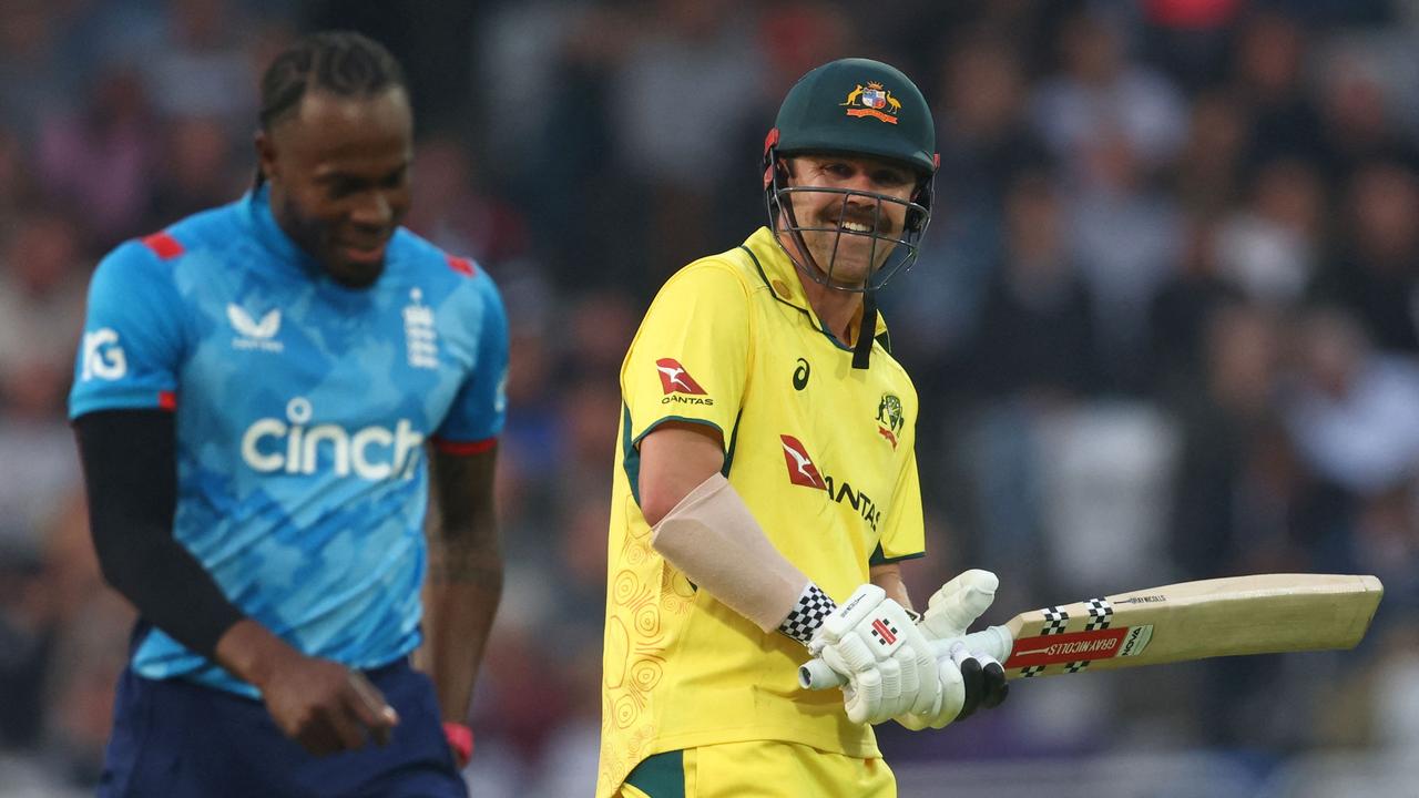 Head shares a laugh with Jofra Archer, who leaked 53 runs from six wicketless overs. (Photo by Darren Staples / AFP)