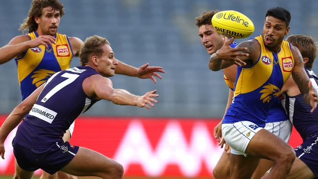 Tim Kelly (right) is in the AFL’s health and safety protocols and out for round 1. Picture: Getty Images