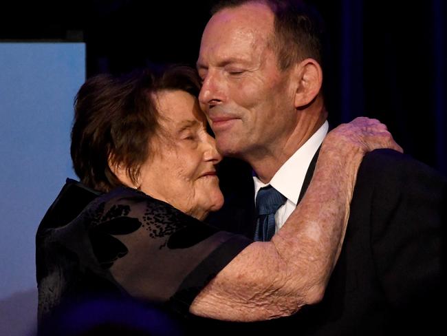 Former prime minister Tony Abbott is embraced by his mum Fay Abbott. Picture: AAP