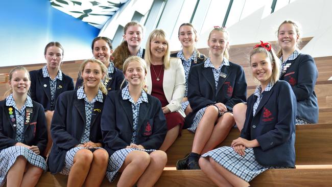 Toorak College principal Kristy Kendall with senior students.