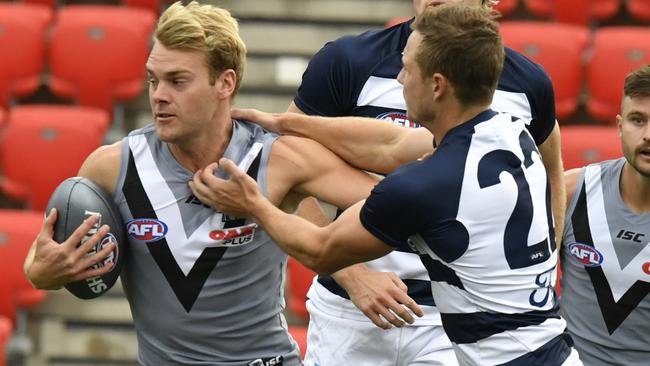 Jack Watts is tackled during AFLX. Picture: AAP Images