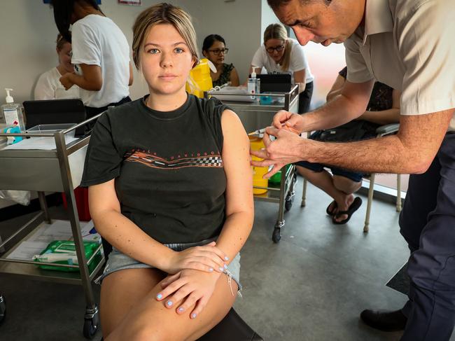 31/3/2021Elle Lockayne (22) is administered a COVID-19 vaccine by GP Sean Stevens  at East Victoria ParkPic Colin Murty The Australian