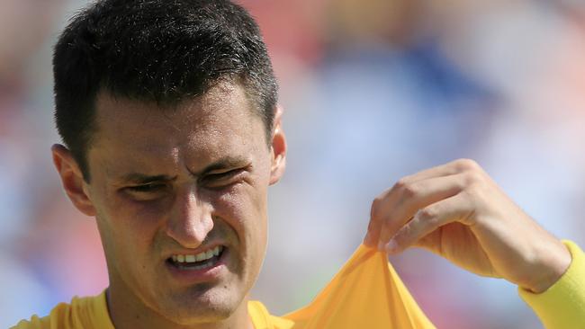 Bernard Tomic advanced to the semis at Queens despite severe back pain prior to the match. Picture: Wayne Ludbey