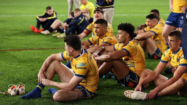 The Eels look dejected after defeat in the 2022 NRL Grand Final match between the Penrith Panthers and the Parramatta Eels at Accor Stadium.