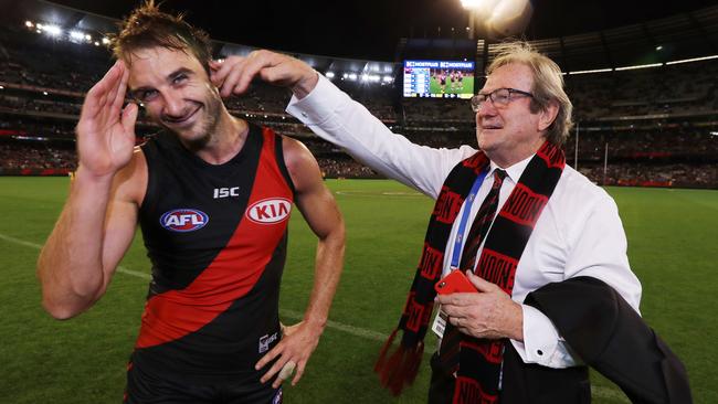 Kevin Sheedy congratulates Jobe Watson after Round 1. Picture: Michael Klein