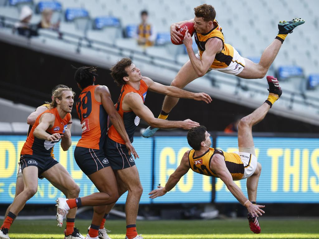 Tim O'Brien (playing for the Hawks) takes a spectacular mark in round 15 2021. Picture: Daniel Pockett/Getty Images