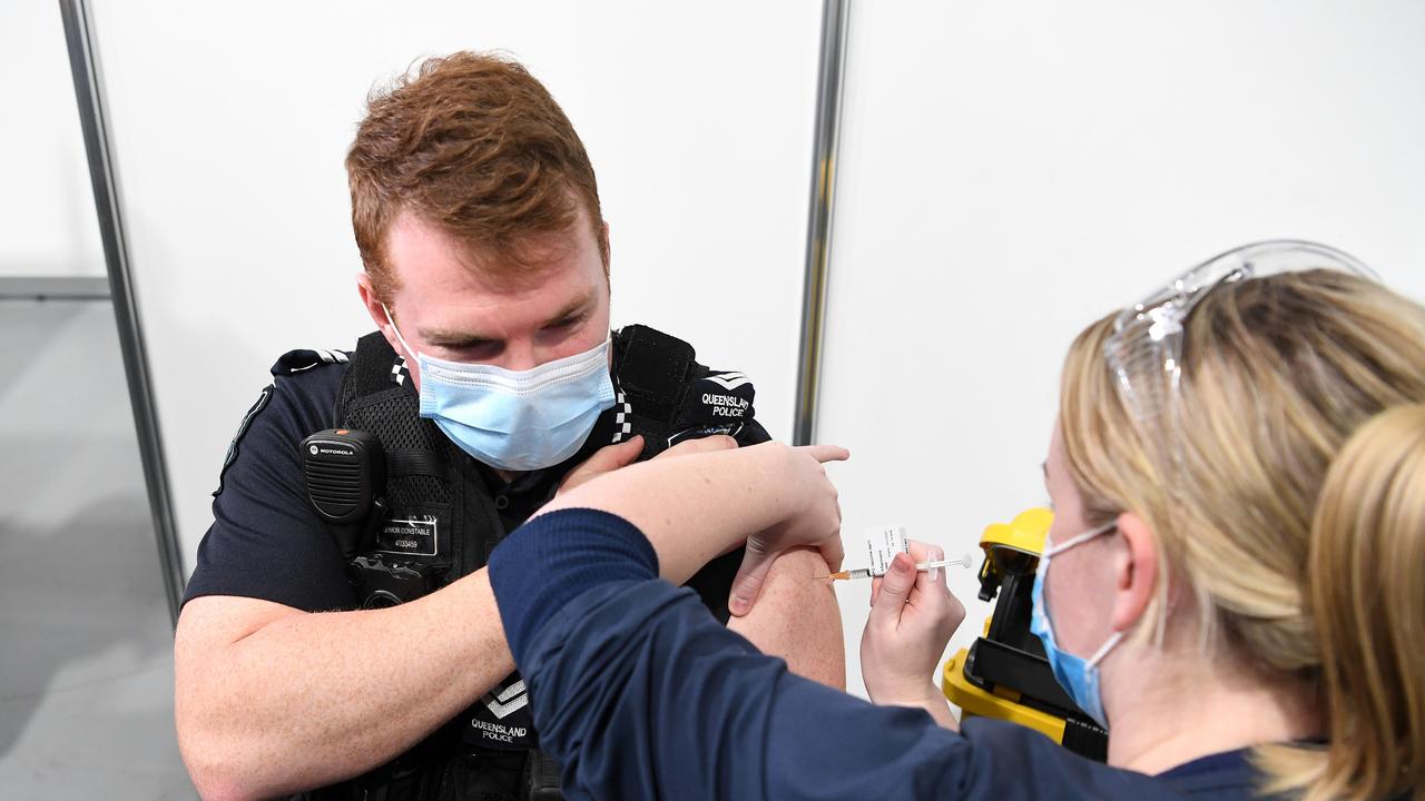 Queensland Police officer Senior Constable Daniel Horne receives the Pfizer Covid-19 vaccine. Picture: NCA NewsWire / Dan Peled