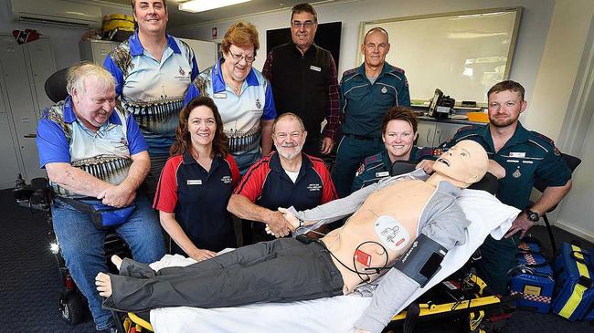 Hervey Bay Local Ambulance Committee with their new mannequin Kev - Front (L) Adrian Doyle, Jo-Anne and Ian Farrell, Cassie Taylor and Chris Giltrap. Back (L) Wayne Frecklington, Merryn Napier, Shane Schiffke and Mark Black. Picture: Alistair Brightman