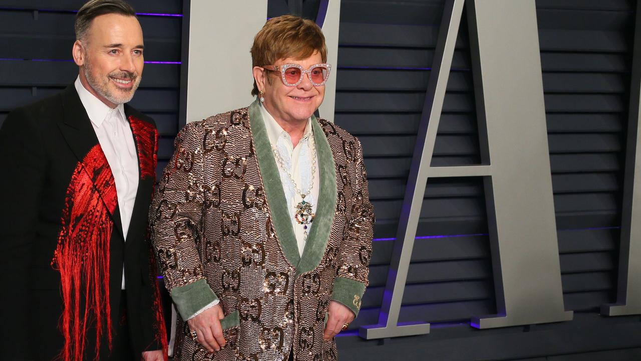 Elton John and his husband David Furnish at the 2019 Vanity Fair Oscar Party. Picture: JB Lacroix / AFP