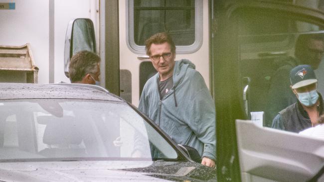 Neeson leaving his trailer. Picture: Jason Edwards