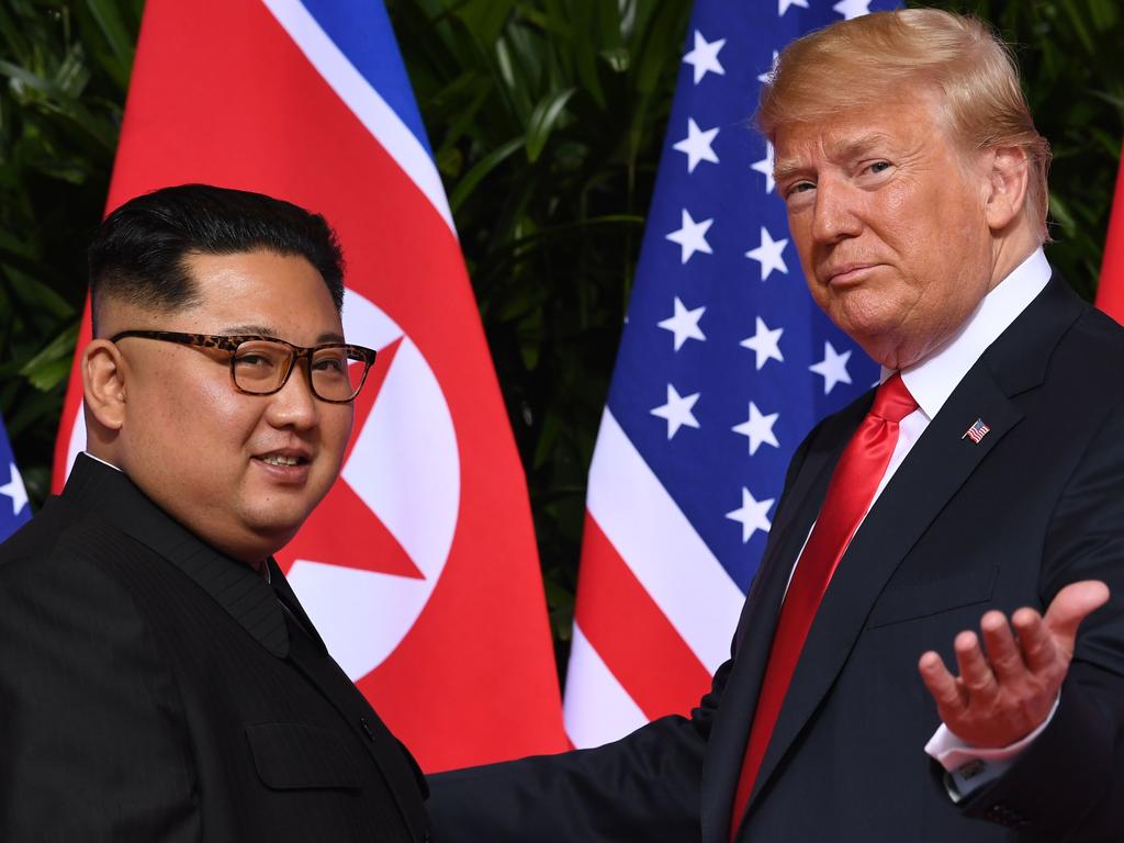 US President Donald Trump (R) meets with North Korea's leader Kim Jong-un. Picture: AFP