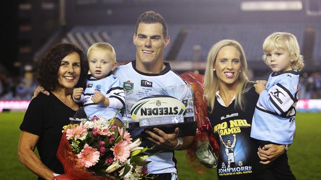 Cronulla’s John Morris after his 300th NRL game with mother Sharyn, son Taj, wife Michelle and son Cruz. Picture: Brett Costello