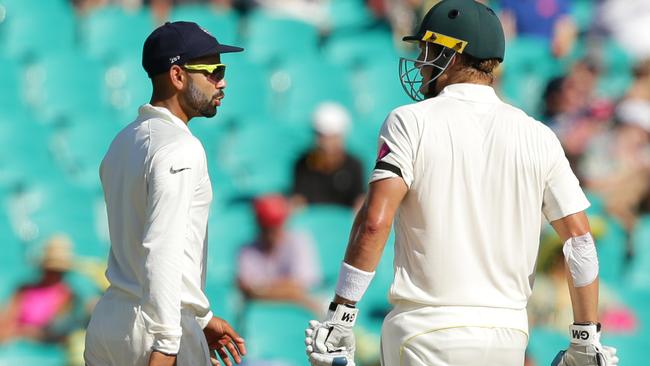 Virat Kohli has a run-in with Shane Watson in 2015. Picture: Gregg Porteous