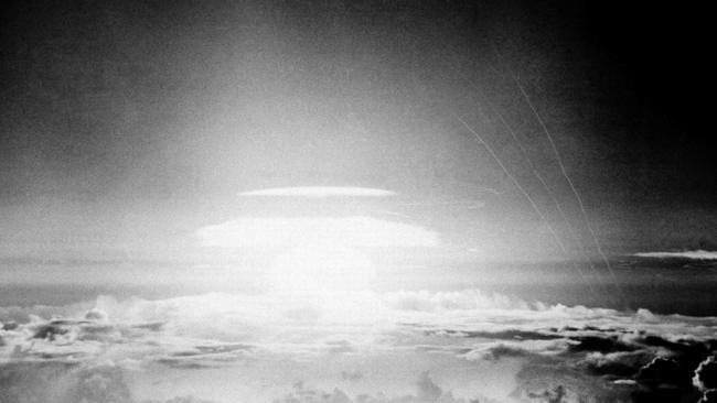 The fireball of a hydrogen bomb lights the Pacific sky a few seconds after the bomb was released over the Bikini Atoll in 1956. Picture: AP Photo, File