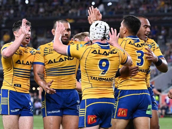 TOWNSVILLE, AUSTRALIA - SEPTEMBER 23: Eels celebrate a try by Will Penisini during the NRL Preliminary Final match between the North Queensland Cowboys and the Parramatta Eels at Queensland Country Bank Stadium on September 23, 2022 in Townsville, Australia. (Photo by Bradley Kanaris/Getty Images)