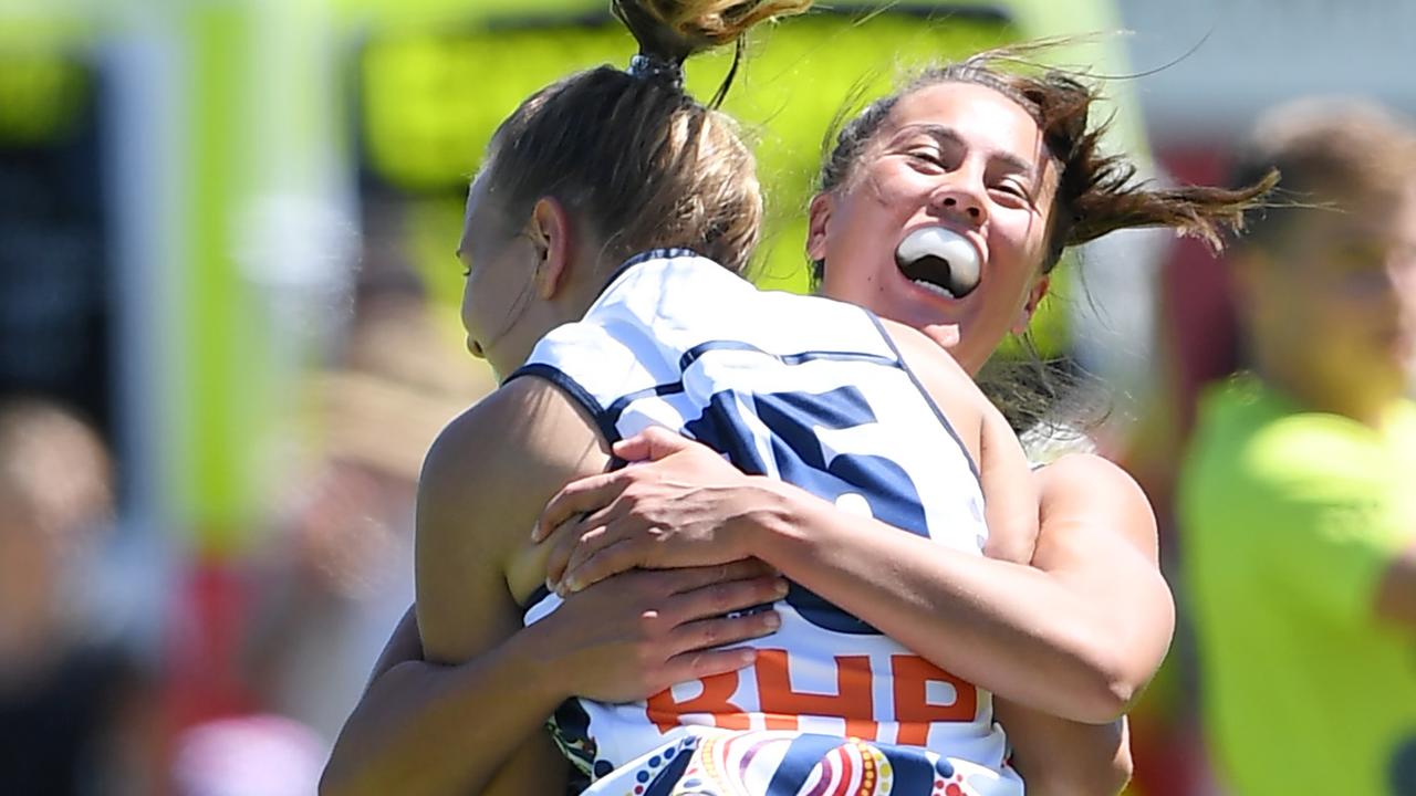 Danielle Ponter celebrates another Adelaide goal with Ebony Marinoff.