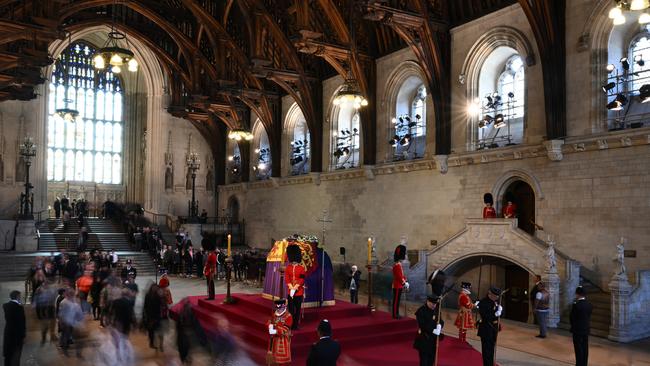 Members of the public pay their respects as they pass the coffin of Queen Elizabeth II as it Lies in State inside Westminster Hall. Picture: Getty Images