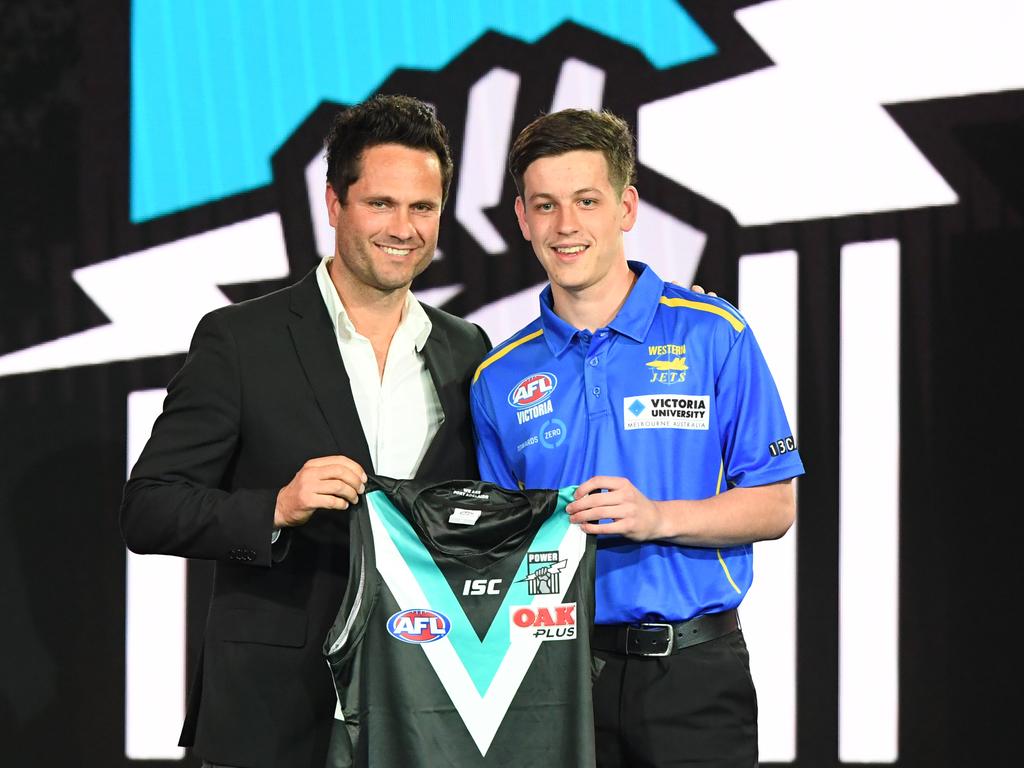 Zak Butters with Gavin Wanganeen at the 2018 draft. (AAP Image/James Ross)