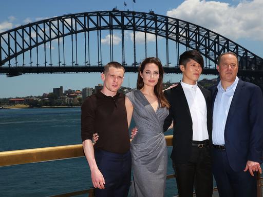 Jack O’Connell, Angelina Jolie, Miyavi Ishihara and Matthew Baer pose at the photo call of Unbroken at Sydney Opera House on November 18, 2014 in Sydney, Australia. Picture: Getty