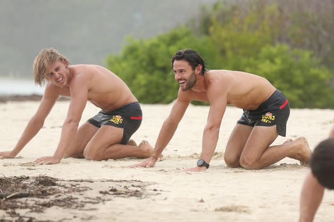 GOLD COAST, AUSTRALIA - JANUARY 23: Jeremy Sharp and Lachie Weller during a Gold Coast Suns AFL training session at Palm Beach Parklands on January 23, 2020 in Gold Coast, Australia. (Photo by Chris Hyde/Getty Images)