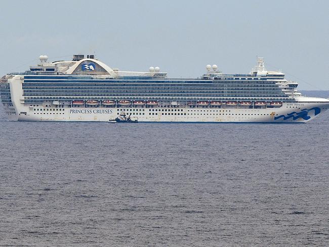 The Princess Cruises owned Ruby Princess cruise ship in waters off Sydney, Monday, March 30, 2020. A shutdown of non-essential services is in effect Australia wide in a bid to slow the spread of the coronavirus (COVID-19) disease. (AAP Image/Joel Carrett) NO ARCHIVING