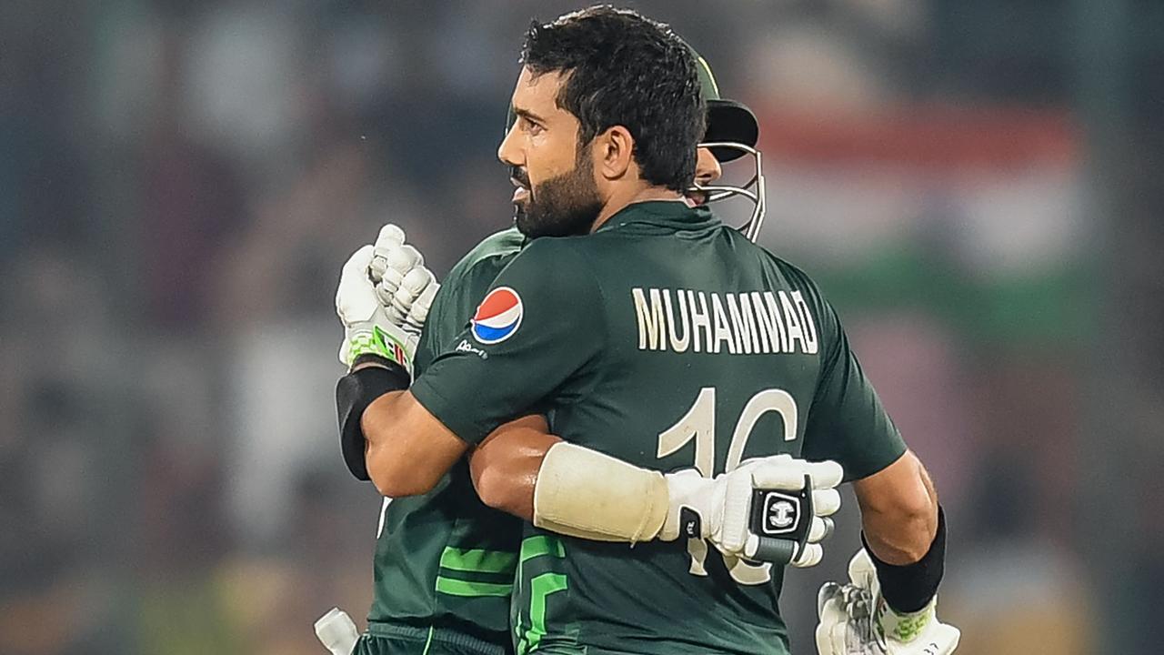 Pakistan's Mohammad Rizwan with teammate Saud Shakeel. Photo by Noah SEELAM / AFP.