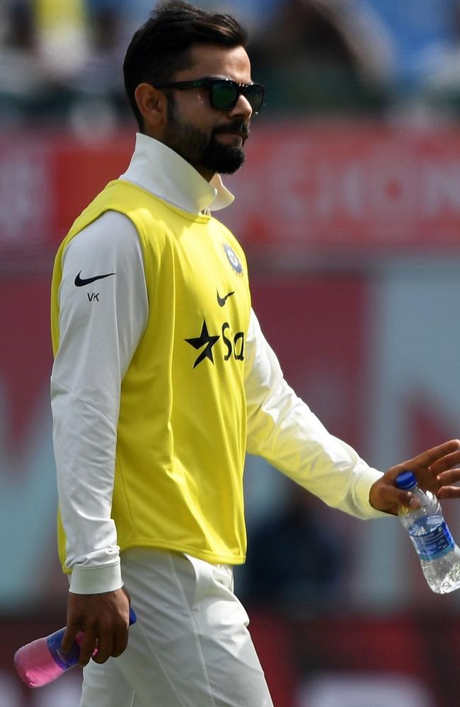 Virat Kohli was on drinks duties in Dharamsala.