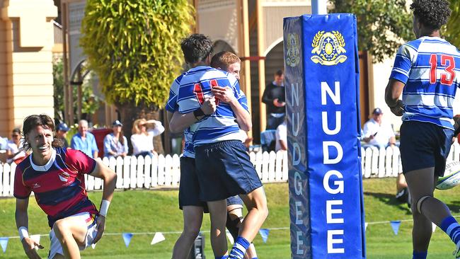 Nudgee College players celebrate a try Nudgee College v BSHS in the GPS First XV rugby. Saturday August 20, 2022. Picture, John Gass