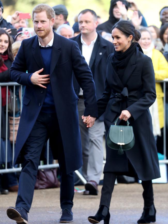 CARDIFF, WALES - JANUARY 18: Prince Harry and his fiancee Meghan Markle are seen during a walkabout at Cardiff Castle on January 18, 2018 in Cardiff, Wales. Picture: Getty