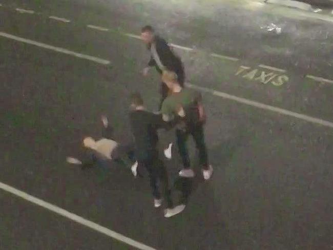 The man lies motionless after the attack. Picture via The Sun